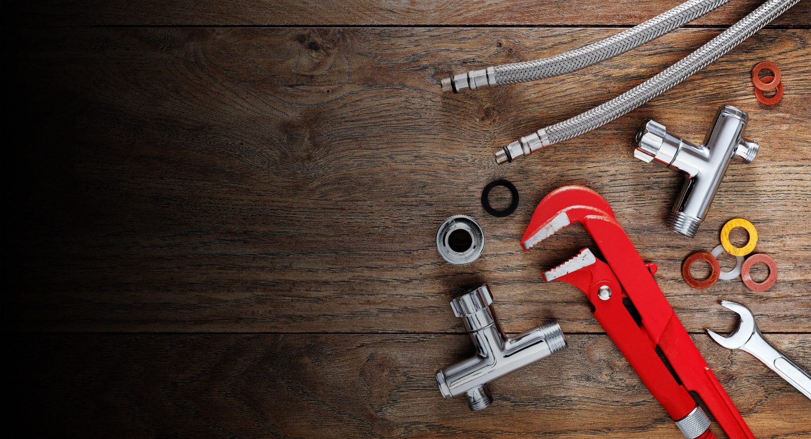 A banner with tools used for plumbing